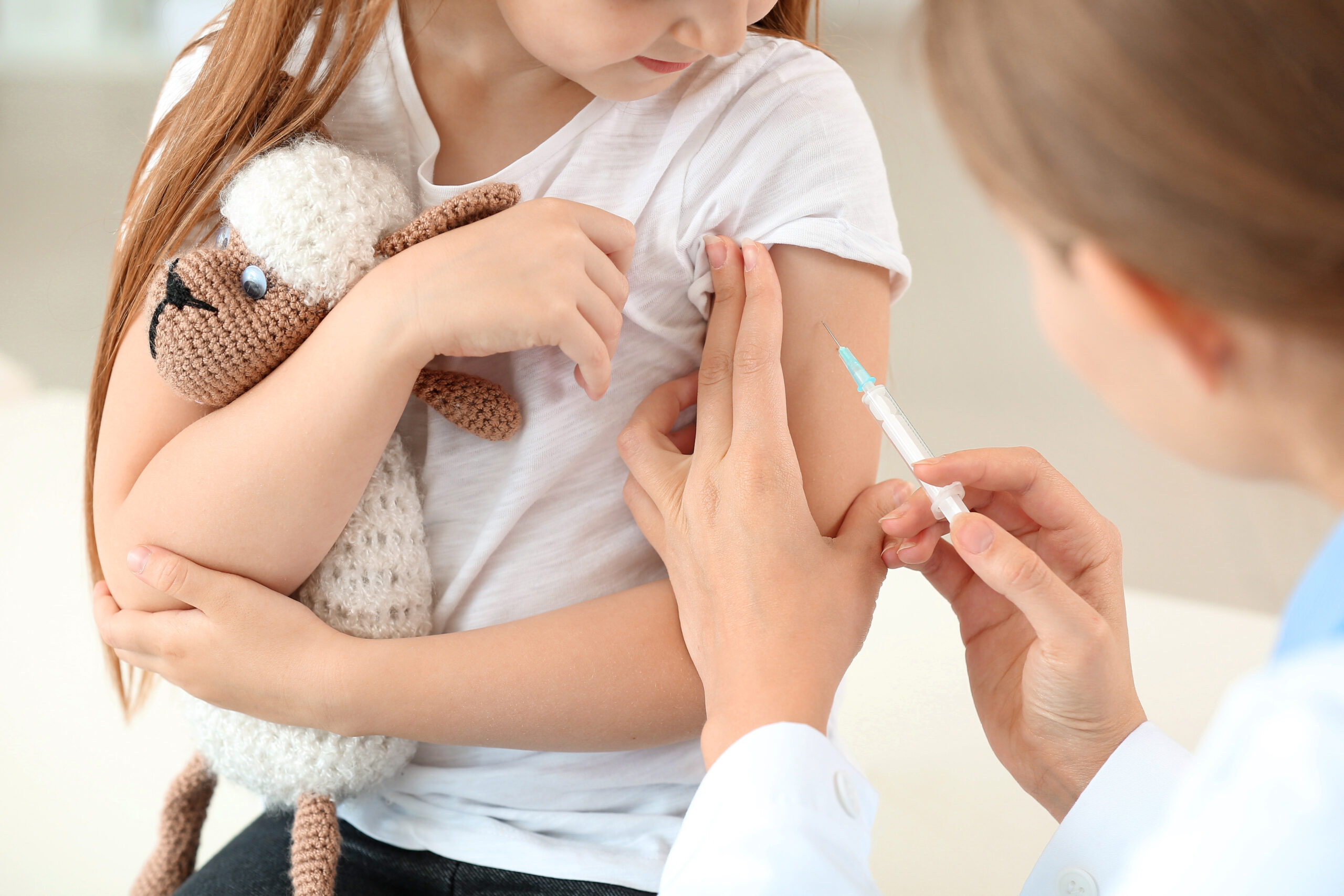 child receiving chickenpox vaccine