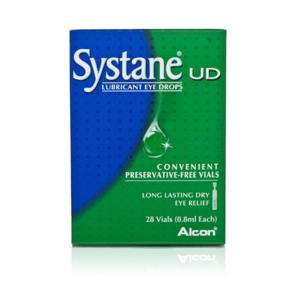 A box of Systane UD Lubricant Eye Drops. The packaging is predominantly blue and green with a large white and green ‘Systane’ logo at the top. Below the logo, in smaller white text, ‘UD’ is printed, followed by ‘Lubricant Eye Drops’ in larger font. A tagline reads ‘Convenient Preservative-Free Vials.’ Additional information includes ‘Long Lasting Dry Eye Relief,’ and the quantity is specified as ‘28 Vials (0.8ml Each).’ The Alcon logo appears at the bottom right corner, indicating the brand. The overall design features a graphic of a single eye drop on a leaf, symbolizing the natural relief aspect of the product.