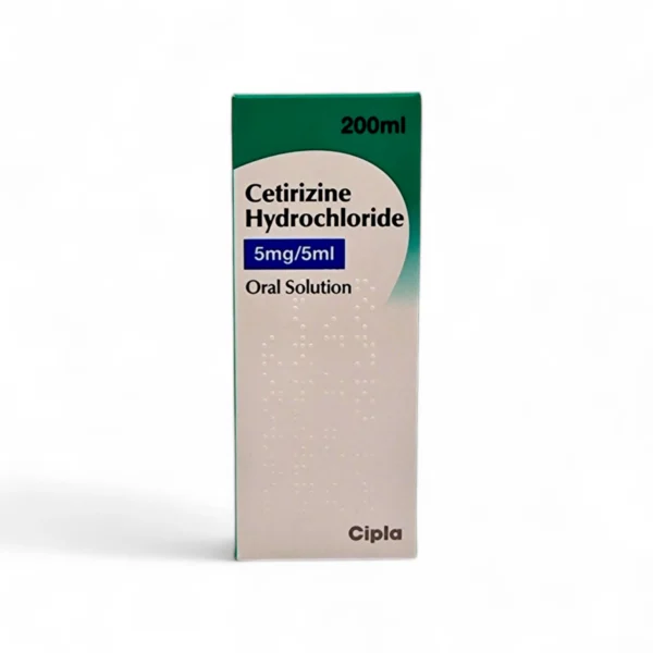 A 200ml Cetirizine Hydrochloride oral solution box with a concentration of 5mg/5ml, manufactured by Cipla. The box is predominantly white with a green top section and displays the product name and dosage information prominently on the front.” This image represents a common over-the-counter medication for allergies, and the packaging provides essential information about the dosage and manufacturer