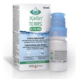A product image featuring a 10 ml bottle of Xailin Tears, which is a 0.1% HA (Hyaluronic Acid) eye drops solution for lubricating the eyes. The bottle is placed in front of its packaging box, which has similar branding and information. The label on the bottle and the box includes multilingual descriptions indicating relief from dry eye sensations such as ocular tiredness, irritation, and discomfort. The brand VISUfarma is also visible on the packaging.