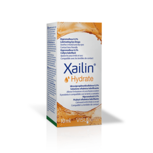 Image of a white and orange box of Xailin® Hydrate 0.3% Eye Drops. The front of the box prominently displays the product name "Xailin® Hydrate" along with "Hypromellose 0.3%" and "Lubricating Eye Drops." The packaging indicates that the drops are suitable for soothing irritated and dry eyes, and are contact lens friendly. The box contains 10ml of the product. Various languages are used to convey the product's purpose and benefits, such as English, French, Italian, and Spanish. The manufacturer's name, VISUfarma, is also visible at the bottom of the box.